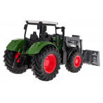 Zelený traktor s buldozérom
